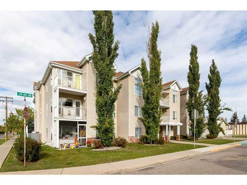 11-7720 39 Avenue Nw, Calgary, AB - Outdoor With Balcony With Facade