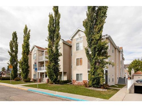 11-7720 39 Avenue Nw, Calgary, AB - Outdoor With Balcony With Facade