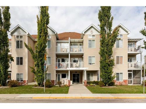 11-7720 39 Avenue Nw, Calgary, AB - Outdoor With Balcony With Facade