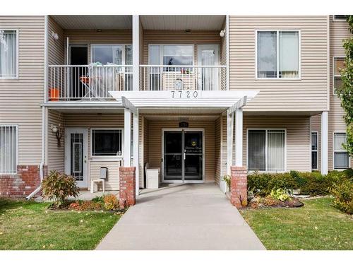 11-7720 39 Avenue Nw, Calgary, AB - Outdoor With Balcony With Facade