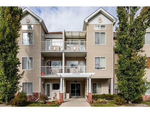 11-7720 39 Avenue Nw, Calgary, AB - Outdoor With Balcony With Facade