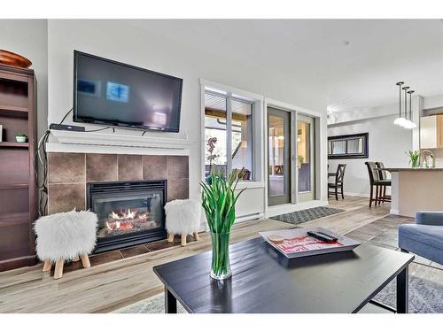 321-101 Montane Road, Canmore, AB - Indoor Photo Showing Living Room With Fireplace