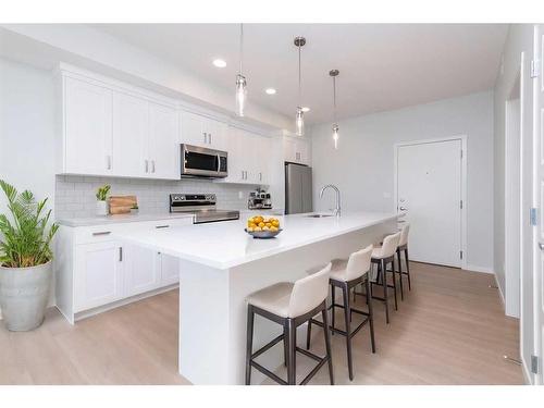 3410-220 Seton Grove Se, Calgary, AB - Indoor Photo Showing Kitchen With Stainless Steel Kitchen With Upgraded Kitchen