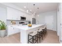 3410-220 Seton Grove Se, Calgary, AB  - Indoor Photo Showing Kitchen With Stainless Steel Kitchen With Upgraded Kitchen 