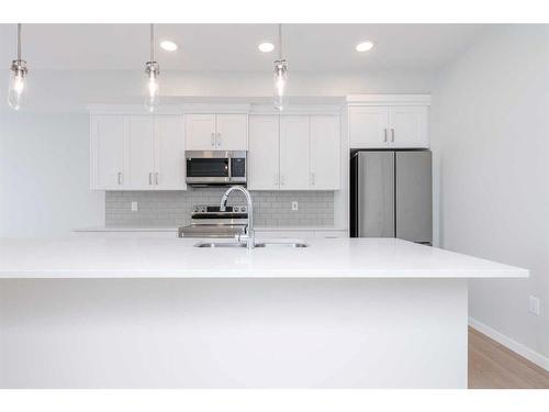 3410-220 Seton Grove Se, Calgary, AB - Indoor Photo Showing Kitchen With Stainless Steel Kitchen With Upgraded Kitchen