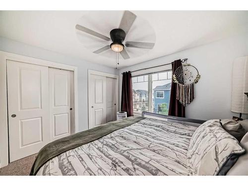 116-2802 Kings Heights Gate Se, Airdrie, AB - Indoor Photo Showing Bedroom