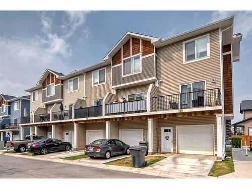 116-2802 Kings Heights Gate Se, Airdrie, AB - Outdoor With Balcony With Facade