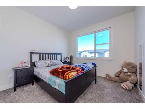 105-116 Saddlestone Heath Ne, Calgary, AB - Indoor Photo Showing Bedroom