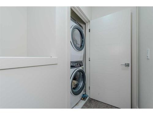 105-116 Saddlestone Heath Ne, Calgary, AB - Indoor Photo Showing Laundry Room