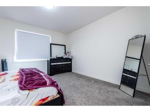 105-116 Saddlestone Heath Ne, Calgary, AB - Indoor Photo Showing Bedroom