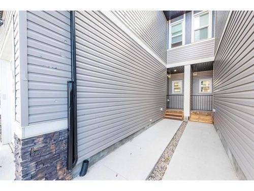 105-116 Saddlestone Heath Ne, Calgary, AB - Outdoor With Exterior