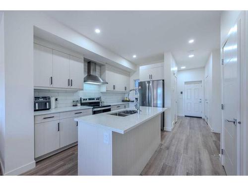 105-116 Saddlestone Heath Ne, Calgary, AB - Indoor Photo Showing Kitchen With Stainless Steel Kitchen With Upgraded Kitchen