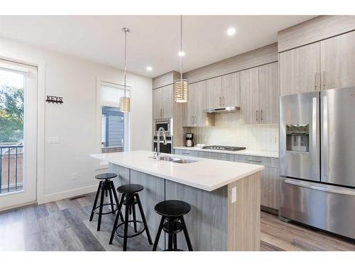 1918 48 Street Nw, Calgary, AB - Indoor Photo Showing Kitchen With Double Sink With Upgraded Kitchen