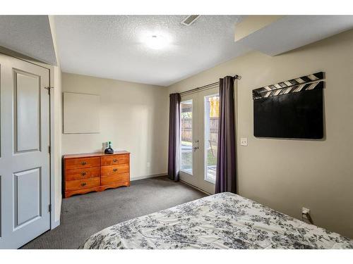 203 Copperpond Row Se, Calgary, AB - Indoor Photo Showing Bedroom