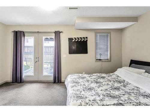 203 Copperpond Row Se, Calgary, AB - Indoor Photo Showing Bedroom