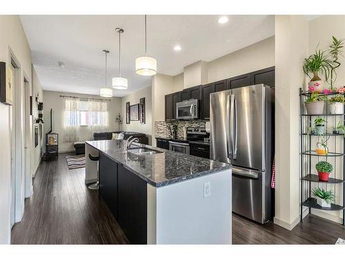 203 Copperpond Row Se, Calgary, AB - Indoor Photo Showing Kitchen With Upgraded Kitchen