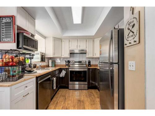 22 Martingrove Mews Ne, Calgary, AB - Indoor Photo Showing Kitchen With Stainless Steel Kitchen With Double Sink