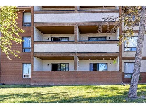 103-1712 38 Street Se, Calgary, AB - Outdoor With Balcony With Facade