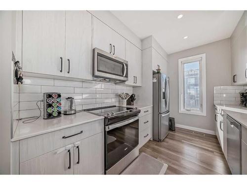 38 Evanscrest Court Nw, Calgary, AB - Indoor Photo Showing Kitchen With Stainless Steel Kitchen With Upgraded Kitchen