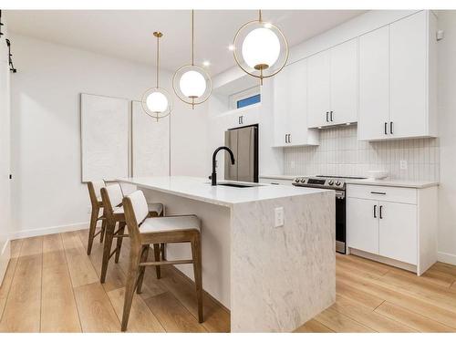 2024 22 Avenue Nw, Calgary, AB - Indoor Photo Showing Kitchen With Upgraded Kitchen