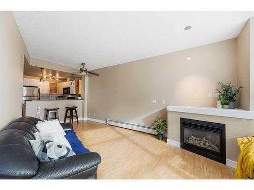 417-315 24 Avenue Sw, Calgary, AB - Indoor Photo Showing Living Room With Fireplace