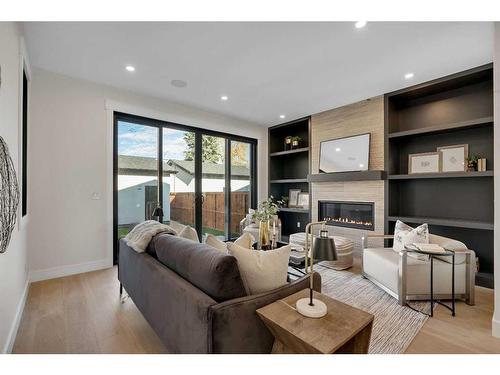 2334 Broadview Road Nw, Calgary, AB - Indoor Photo Showing Living Room With Fireplace