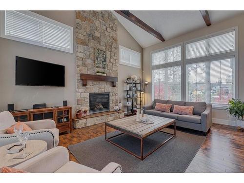 18 Silverado Ranch Way Sw, Calgary, AB - Indoor Photo Showing Living Room With Fireplace