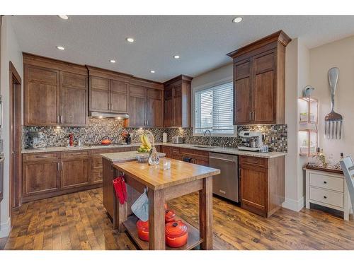 18 Silverado Ranch Way Sw, Calgary, AB - Indoor Photo Showing Kitchen With Upgraded Kitchen