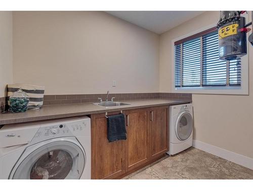 18 Silverado Ranch Way Sw, Calgary, AB - Indoor Photo Showing Laundry Room