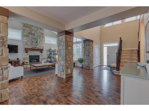 18 Silverado Ranch Way Sw, Calgary, AB - Indoor Photo Showing Living Room With Fireplace