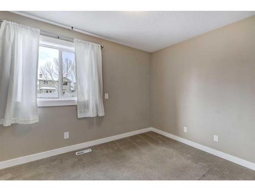 61 Coventry Close Ne, Calgary, AB - Indoor Photo Showing Other Room