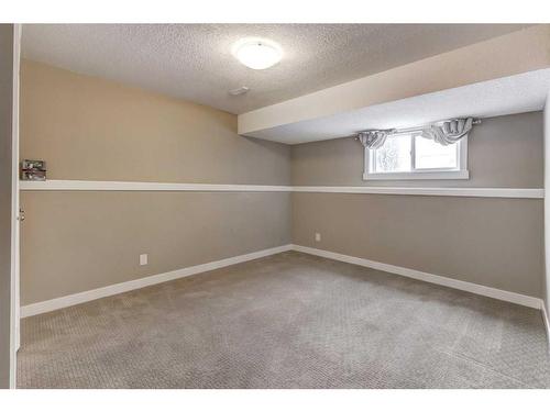 61 Coventry Close Ne, Calgary, AB - Indoor Photo Showing Other Room