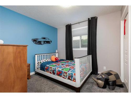 244 Nolanfield Way Nw, Calgary, AB - Indoor Photo Showing Bedroom