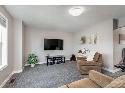 244 Nolanfield Way Nw, Calgary, AB - Indoor Photo Showing Living Room