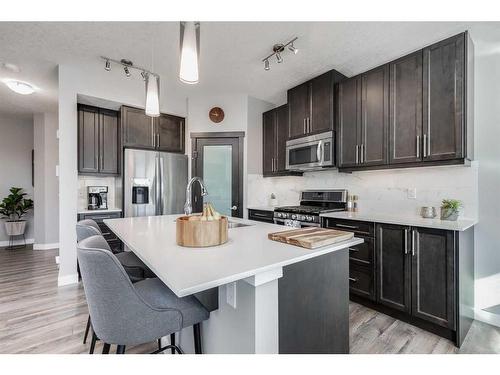 244 Nolanfield Way Nw, Calgary, AB - Indoor Photo Showing Kitchen With Upgraded Kitchen