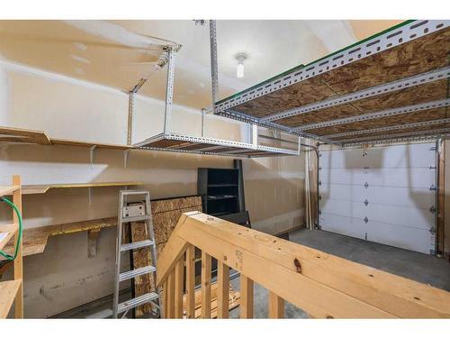 100 Simcoe Place Sw, Calgary, AB - Indoor Photo Showing Garage