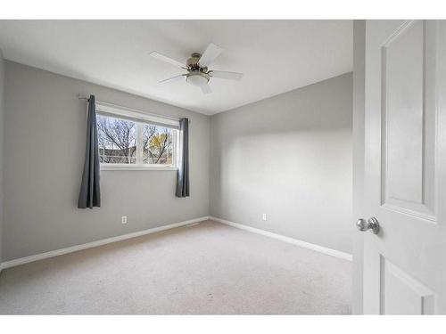 100 Simcoe Place Sw, Calgary, AB - Indoor Photo Showing Other Room