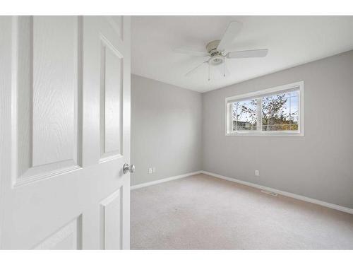 100 Simcoe Place Sw, Calgary, AB - Indoor Photo Showing Other Room