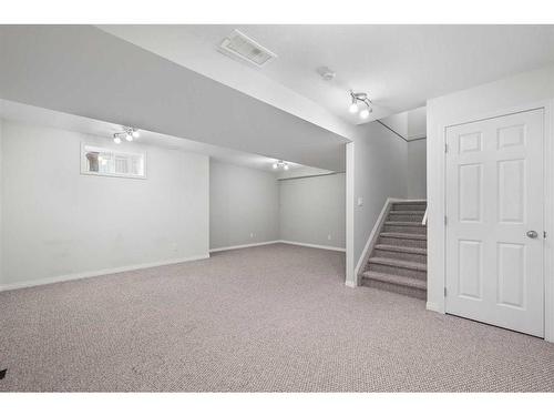 100 Simcoe Place Sw, Calgary, AB - Indoor Photo Showing Other Room