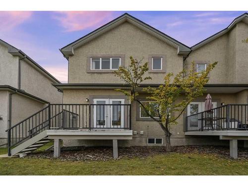 100 Simcoe Place Sw, Calgary, AB - Outdoor With Deck Patio Veranda