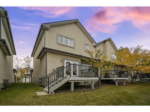 100 Simcoe Place Sw, Calgary, AB - Outdoor With Deck Patio Veranda With Exterior