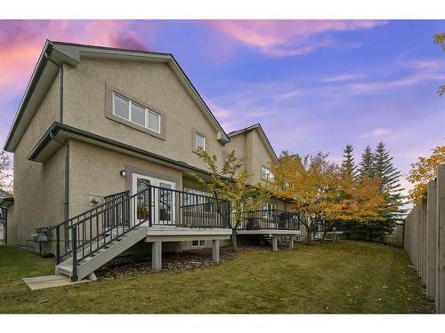 100 Simcoe Place Sw, Calgary, AB - Outdoor With Deck Patio Veranda With Exterior