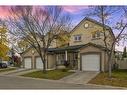 100 Simcoe Place Sw, Calgary, AB  - Outdoor With Facade 