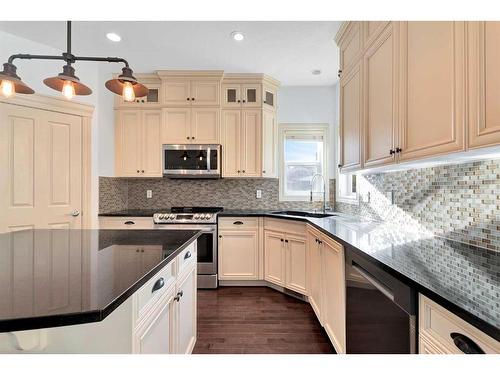 140 Kinlea Link Nw, Calgary, AB - Indoor Photo Showing Kitchen With Upgraded Kitchen