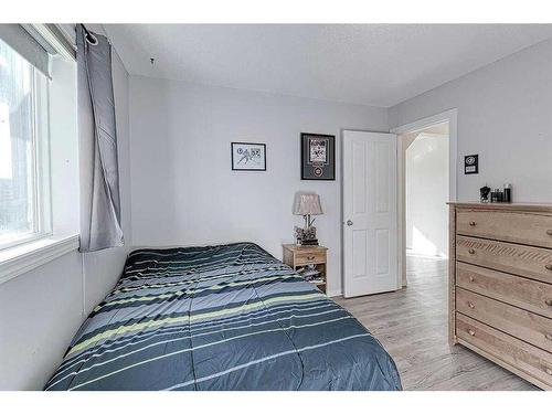 310 Chapalina Gardens Se, Calgary, AB - Indoor Photo Showing Bedroom