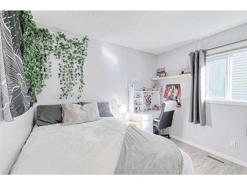 310 Chapalina Gardens Se, Calgary, AB - Indoor Photo Showing Bedroom