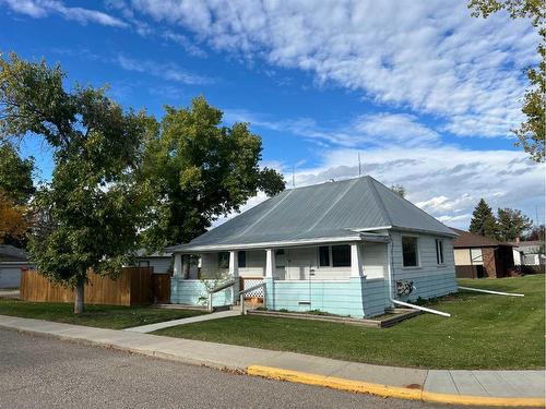 216 4 Avenue South, Vulcan, AB - Outdoor With Facade