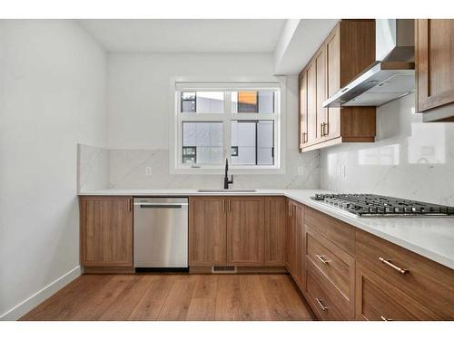 306-8235 8 Avenue Sw, Calgary, AB - Indoor Photo Showing Kitchen With Upgraded Kitchen