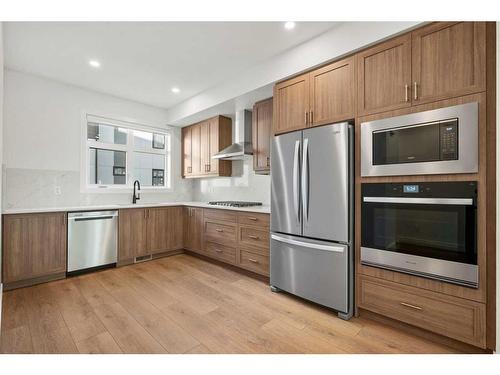 306-8235 8 Avenue Sw, Calgary, AB - Indoor Photo Showing Kitchen