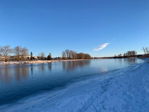 718 Wolf Willow Boulevard Se, Calgary, AB - Outdoor With Body Of Water With View